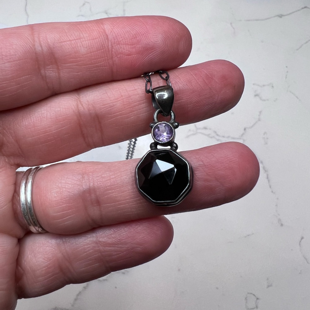 Black onyx and amethyst pendant on oxidized chain
